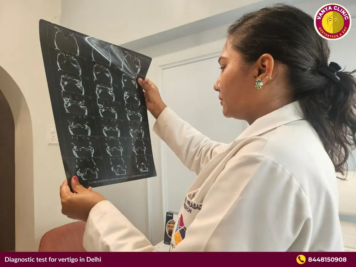 Dr. Purodha Prasad checking MRI Scan for Neurological Vertigo.