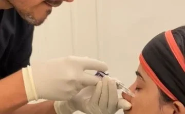 Dr Anil Kumar Kaler Injecting the Botox