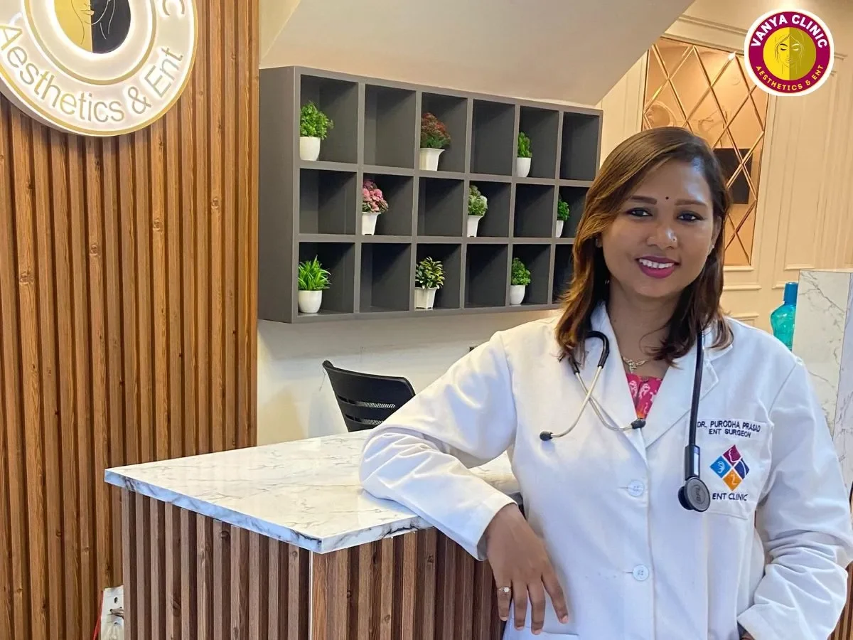 Dr. Purodha Prasad standing at Reception of her ENT clinic in Delhi.