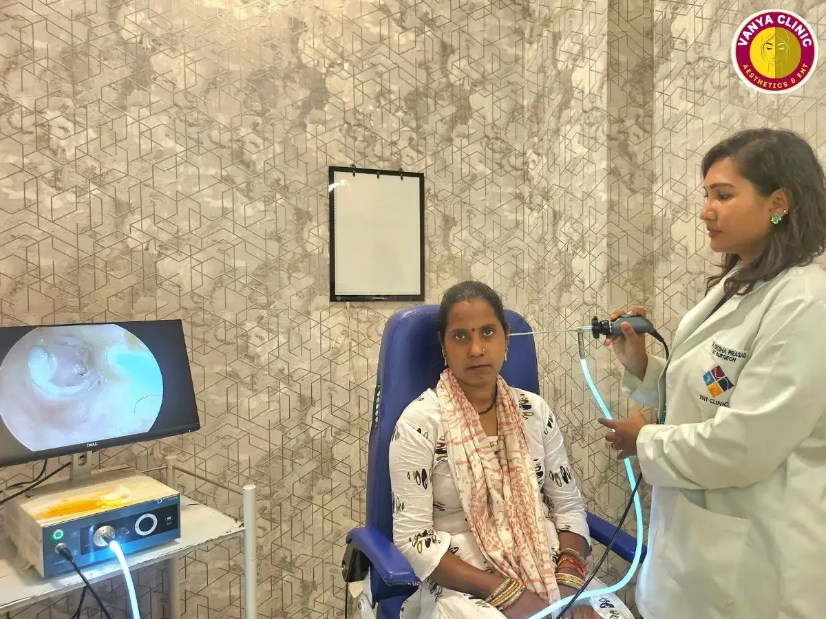Dr. Purodha Prasad doing Ear checkup for patient from Saket, South Delhi.