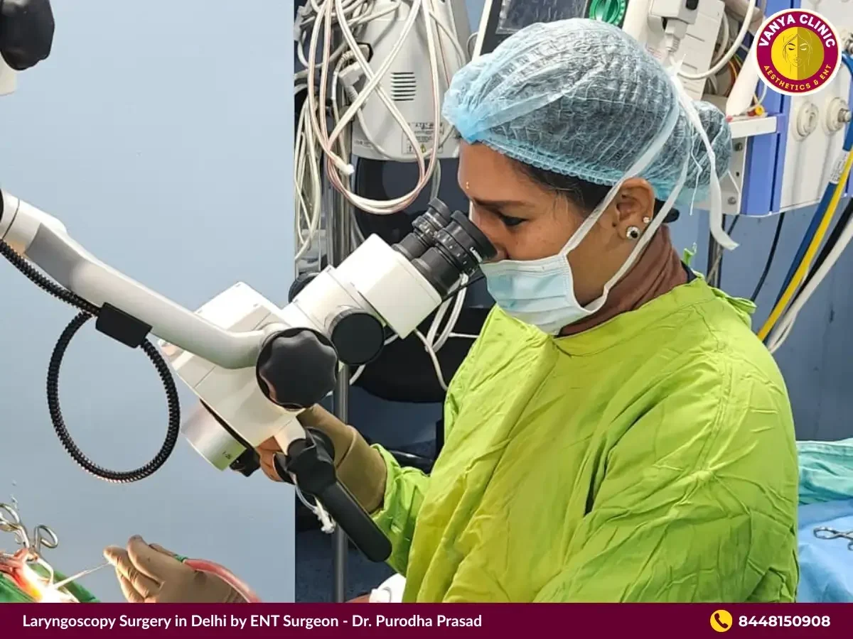 Dr. Purodha Prasad doing Laryngoscopy Surgery in Delhi.