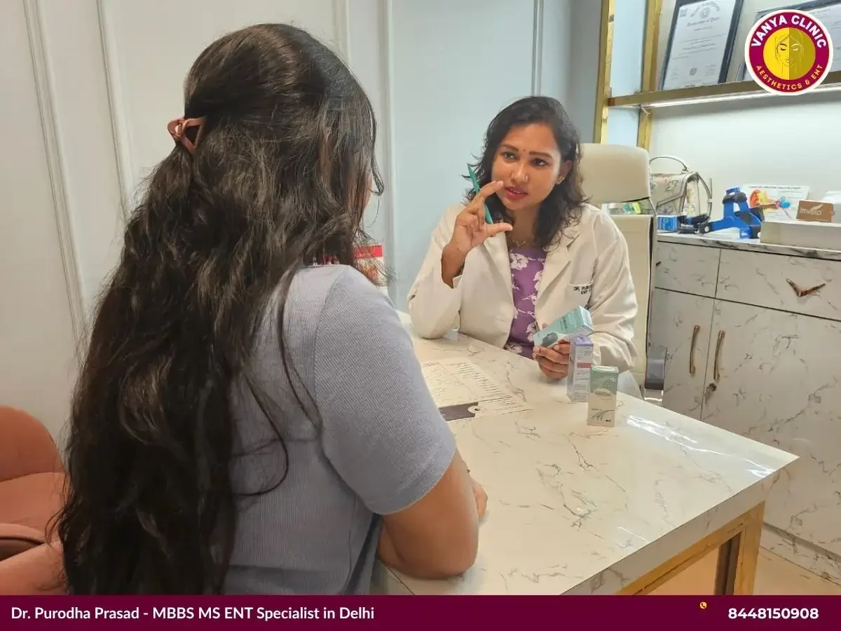 Dr. Purodha Prasad explaining patient about Nasal allergy medication in Delhi.
