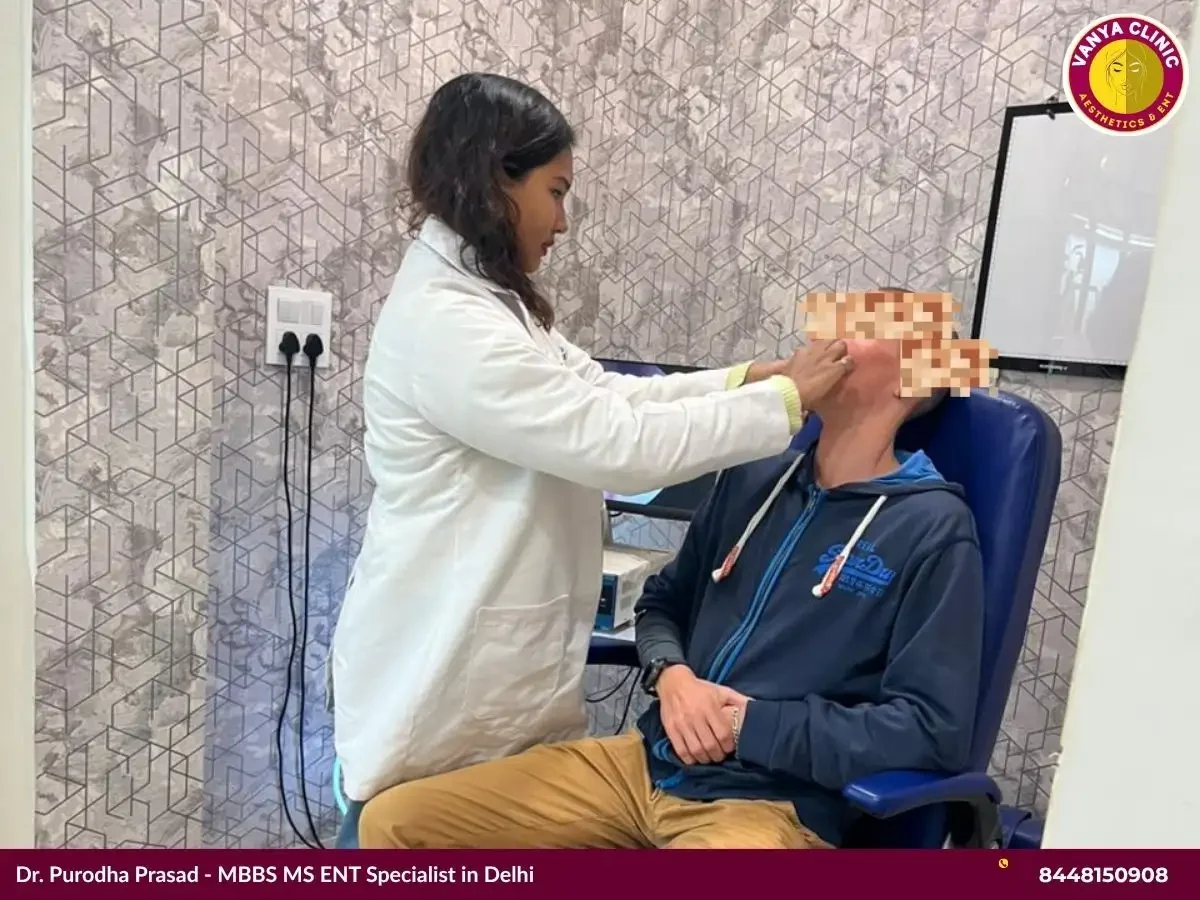 Dr. Purodha Prasad doing Sinus checkup of foreigner patient in Delhi NCR.