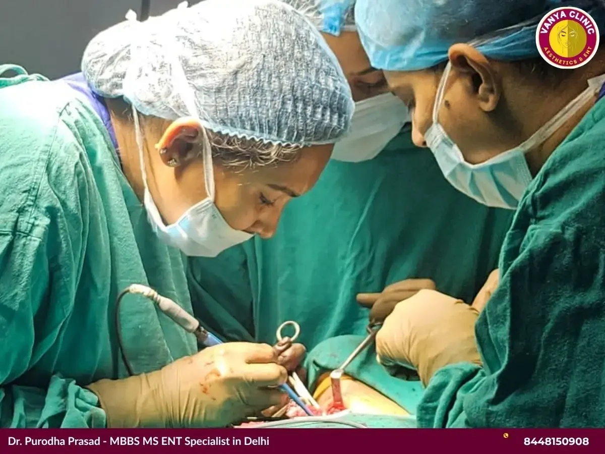 Dr. Purodha Prasad doing Vocal cord surgery with fellow surgeons in Delhi.